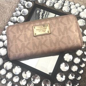 MK rose gold used wallet.
